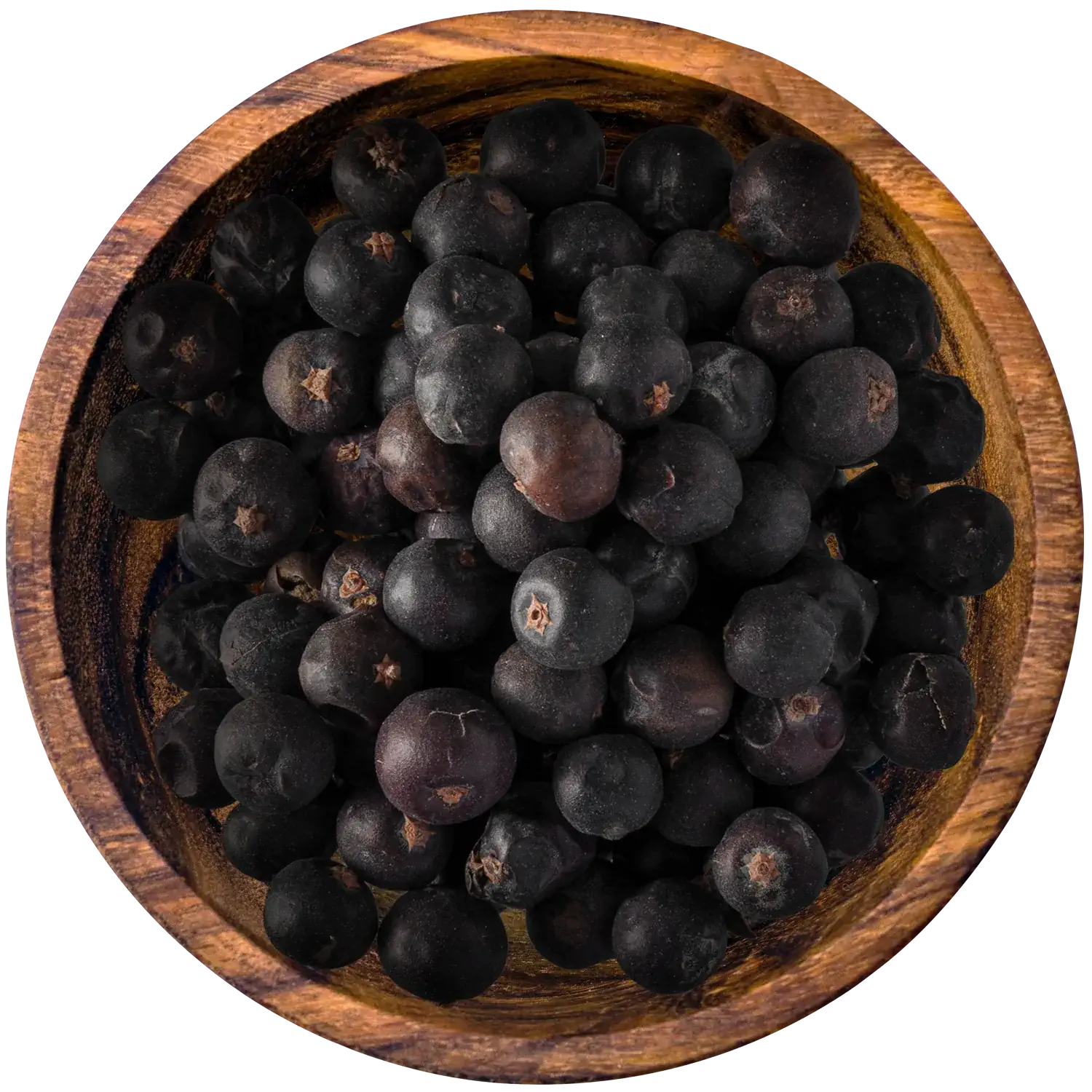 Ganze Wacholderbeeren in einer Holzschale