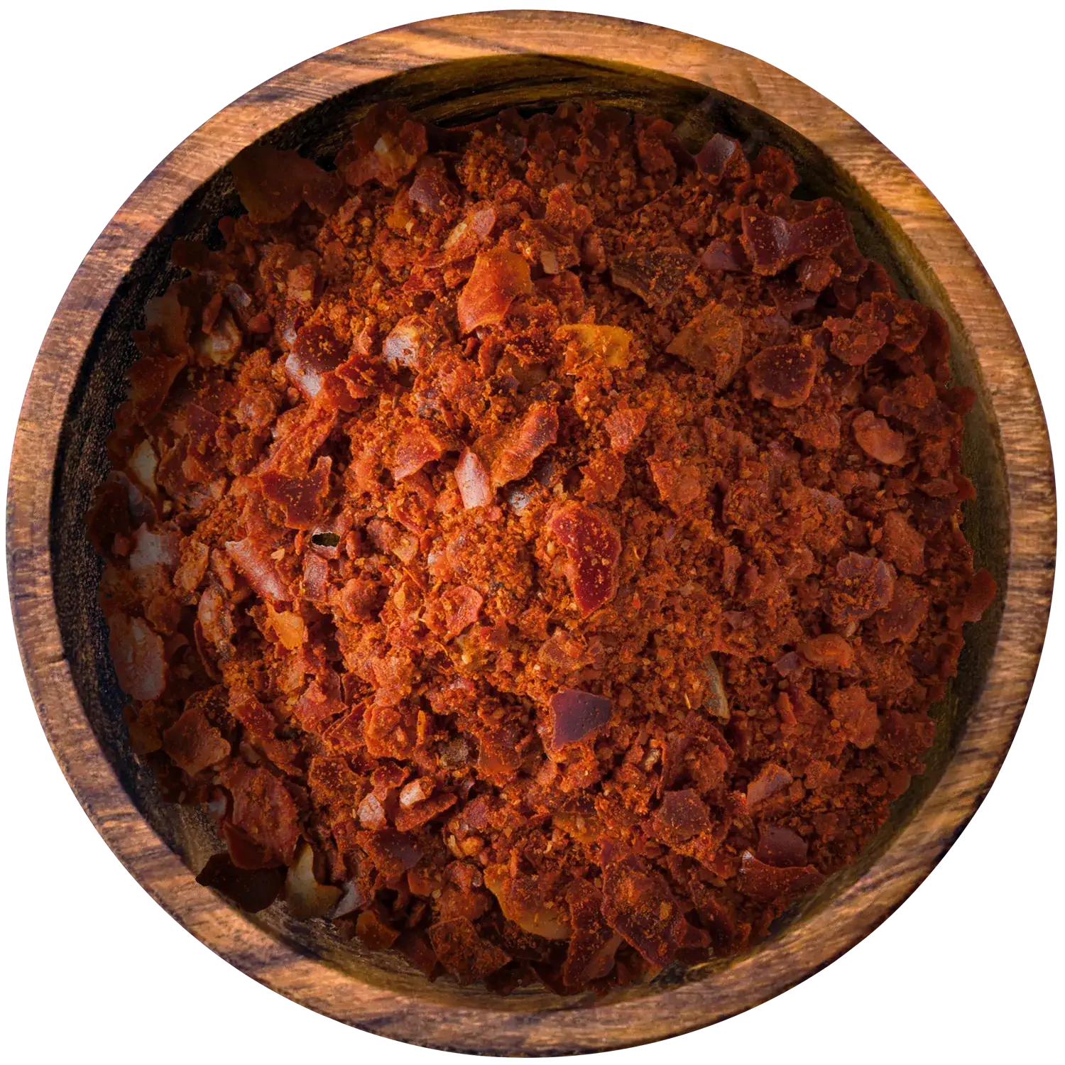 Geschrotetes Harissa in einer Holzschale