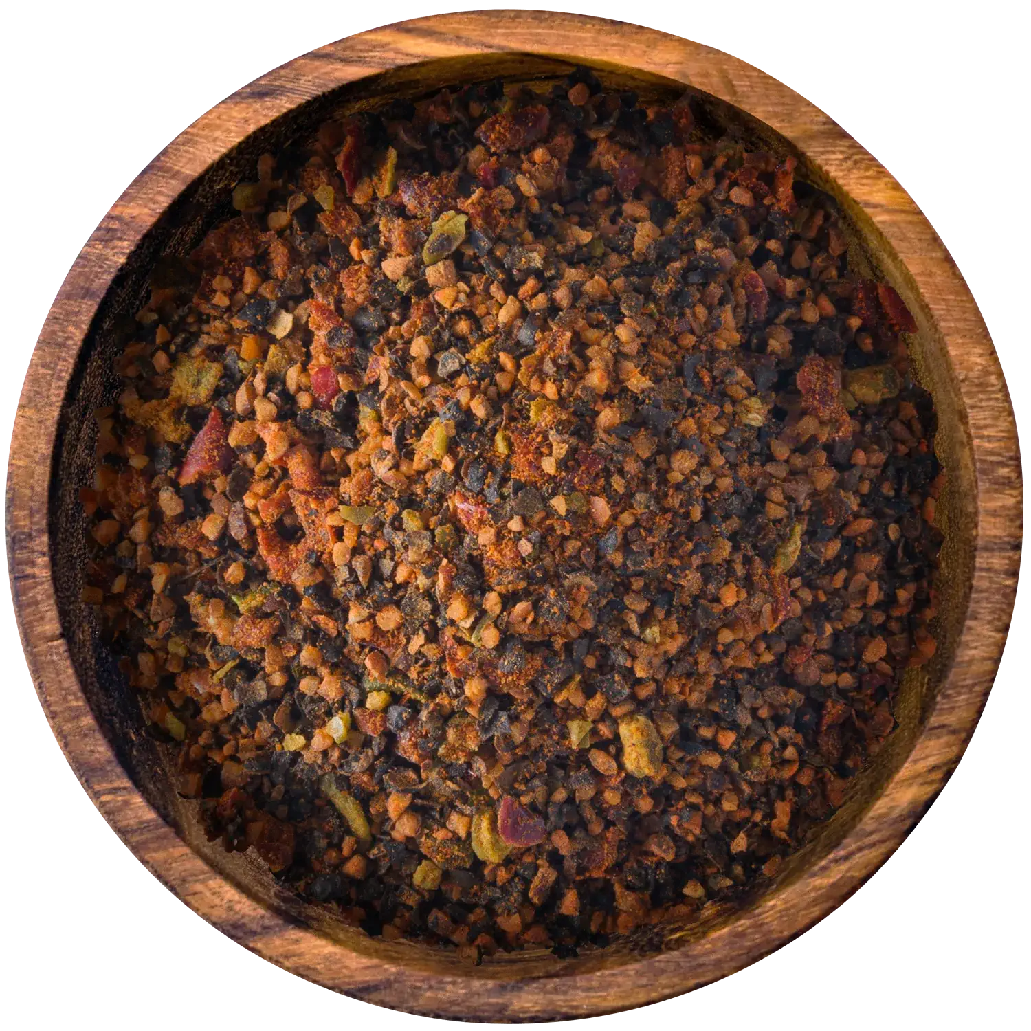 Geschroteter Pariser Pfeffer in einer Holzschale
