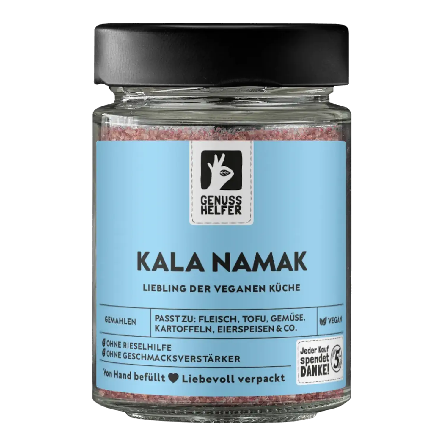 Kala Namak Salz, gemahlen, im Glas Vorderansicht eines Glases mit gemahlenem Kala Namak Salz