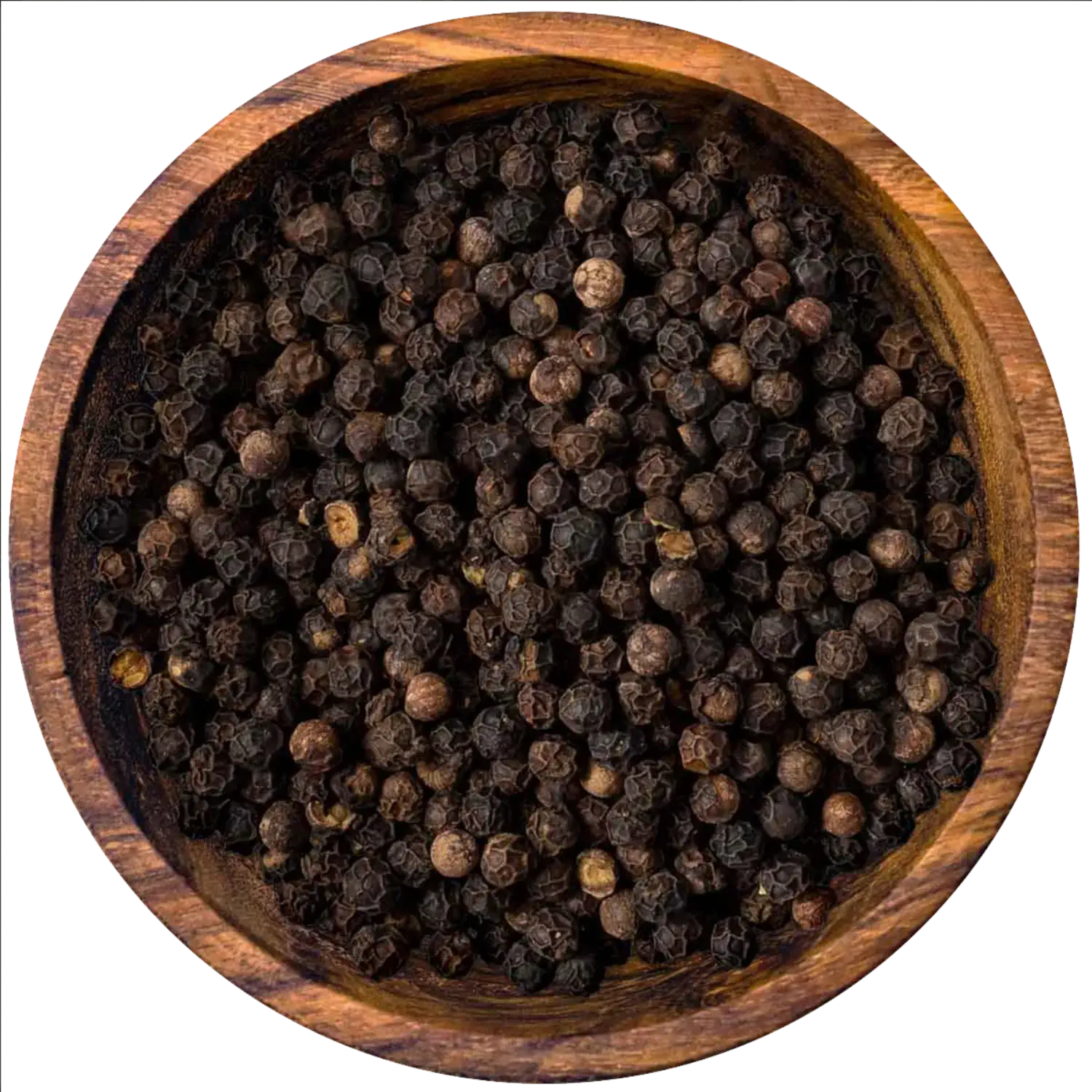 Ganze Banasura-Pfefferkörner in einer Holzschale