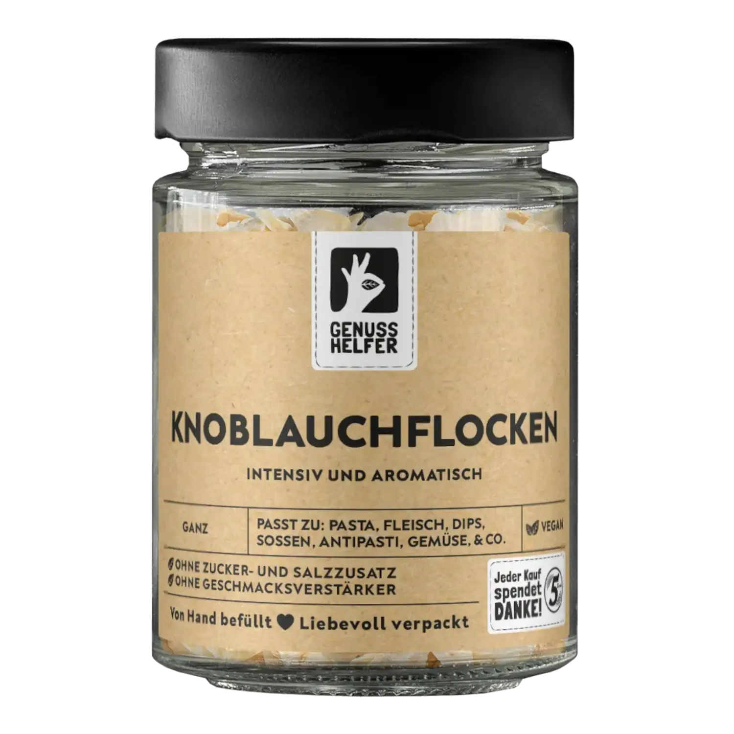 Vorderansicht eines Glases mit ganzen Knoblauchflocken